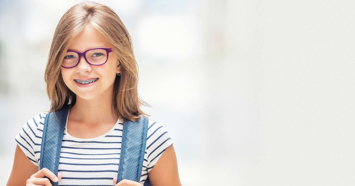 Smiling teen patient with braces - Mile Square Orthodontics, Hoboken NJ