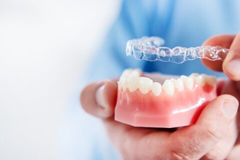 Wearing Invisalign Aligners and Speaking from Mile Square Orthodontics in Hoboken, NJ